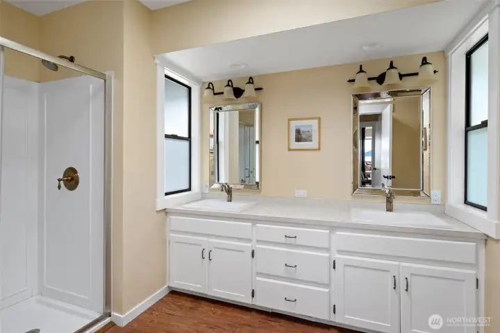 Large primary bathroom witih skylight.
