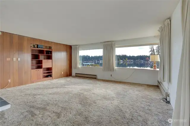Living Room w/Fantastic View of Lake Sawyer. Classic 1950's Paneling and Built-Ins!