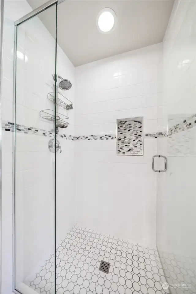 The elegantly appointed shower will make you want to linger just a little bit longer.