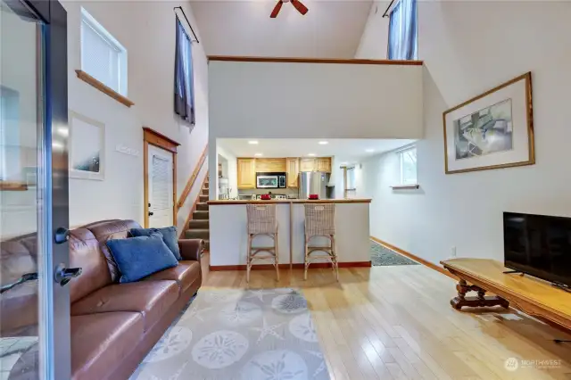 Enter the living room and kitchen dining area.