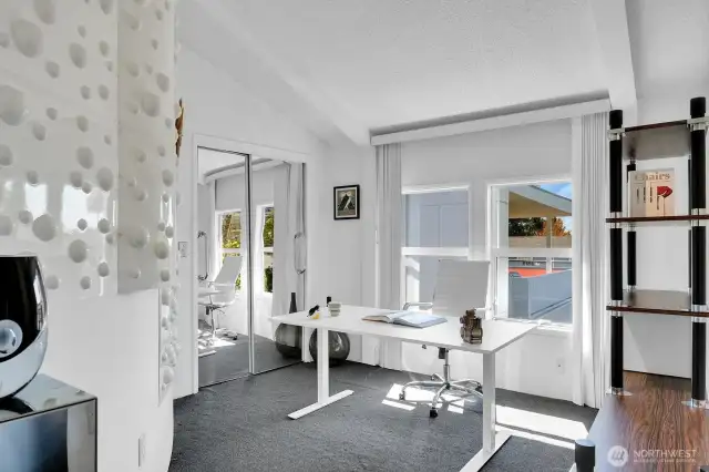 2nd bedroom with South facing windows.