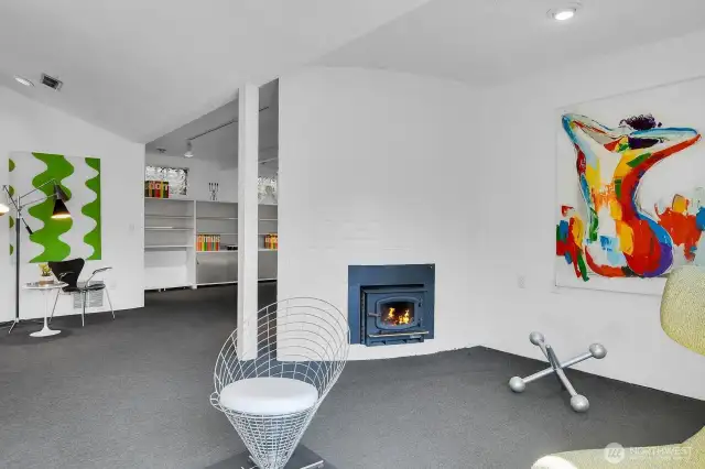 This lower level is a fully functioning ADU living space with an oversized living room, 3/4 bath, kitchen, bedroom and a private exterior entrance.