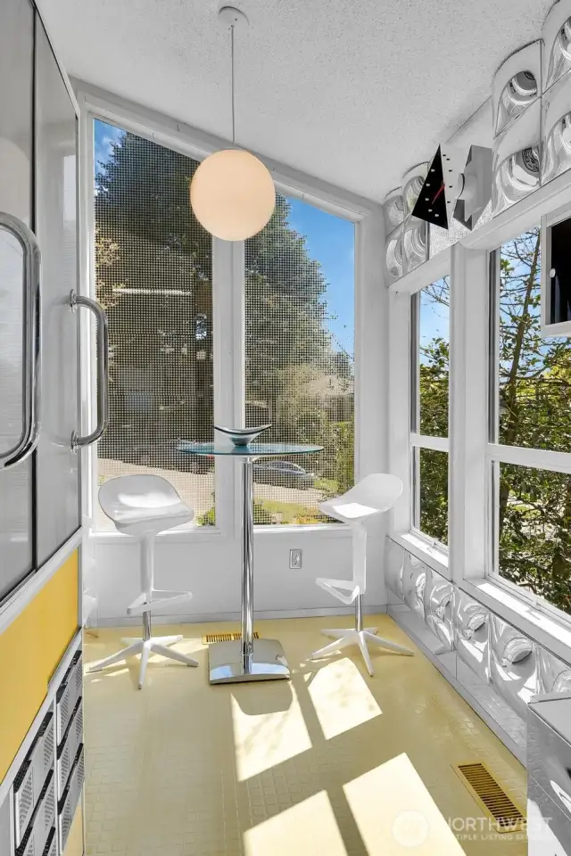 Kitchen eating area with South & East Facing windows for full natural light.
