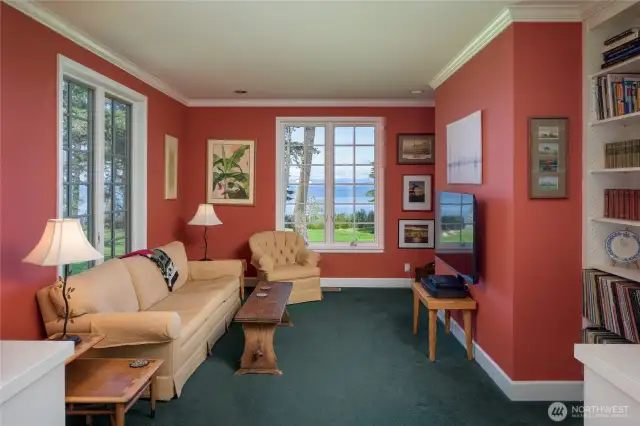 Separate den for reading, music or television.  Lots of built-in bookcases & cabinets.
