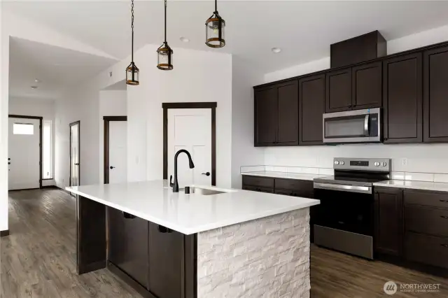 Photo of a similar home in the neighborhood by the same builder