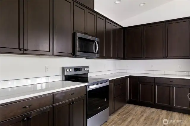 Photo of a similar home in the neighborhood by the same builder