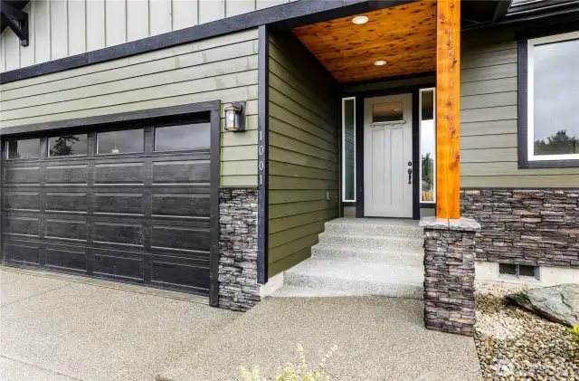 Photo of a similar home in the neighborhood by the same builder