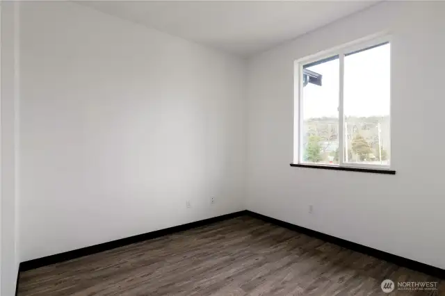 Photo of a similar home in the neighborhood by the same builder