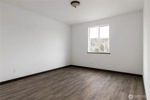 Photo of a similar home in the neighborhood by the same builder