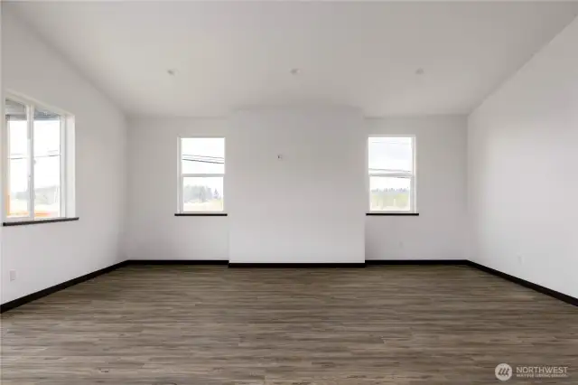 Photo of a similar home in the neighborhood by the same builder
