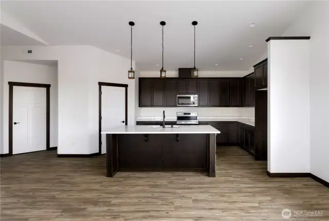 Photo of a similar home in the neighborhood by the same builder