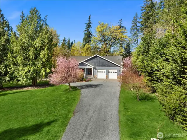 Looking for elbow room and privacy? This home offers a tranquil setting on acreage.