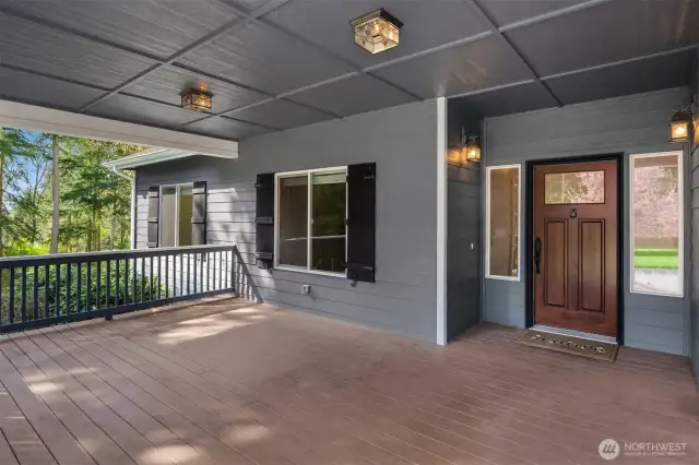 Expansive covered porch, is a great place to relax in the shade.