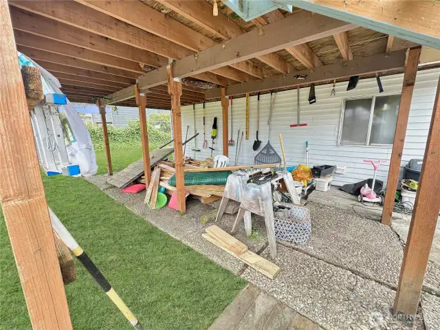 Under deck storage. Grass is enhanced