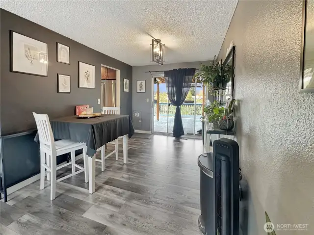 Dining area off the LR and Kitchen, slider to the deck.