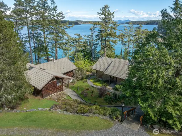 Generational Living at it's best with 2 houses on 440+ feet of waterfront.