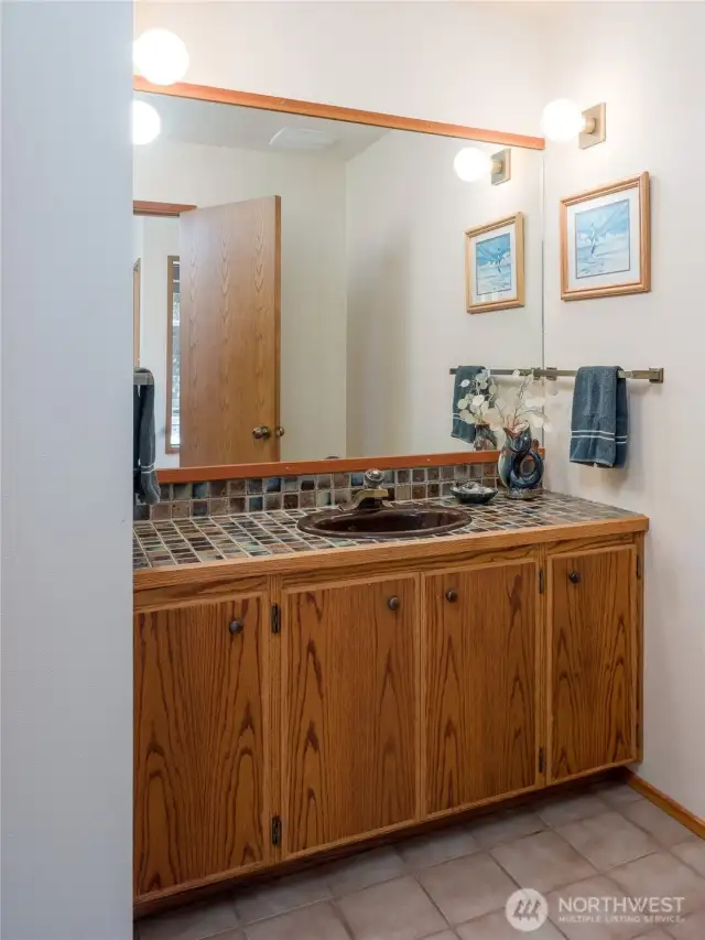Main floor half bath is near front door.