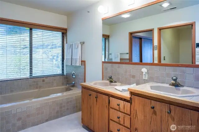Primary bathroom has separate shower plus toilet room.
