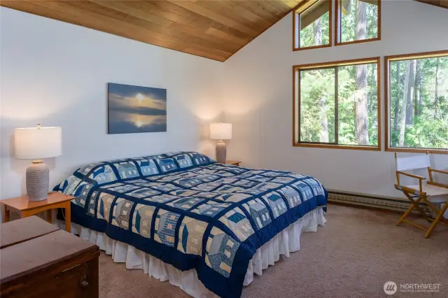 Main bedroom in guesthouse is large enough for a king bed.