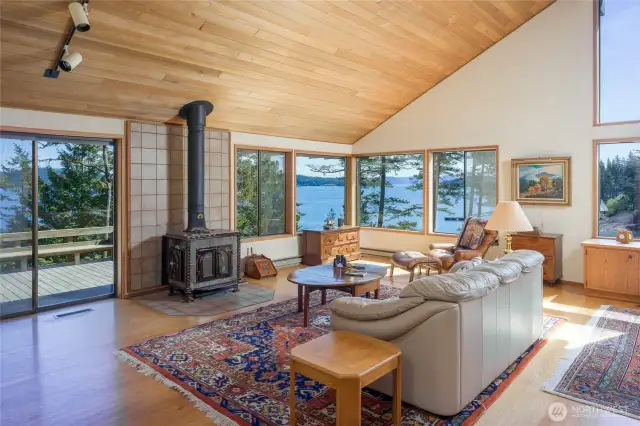 Vaulted cedar ceiling, oak floors, fir trim in Great Room with southeast marine views.