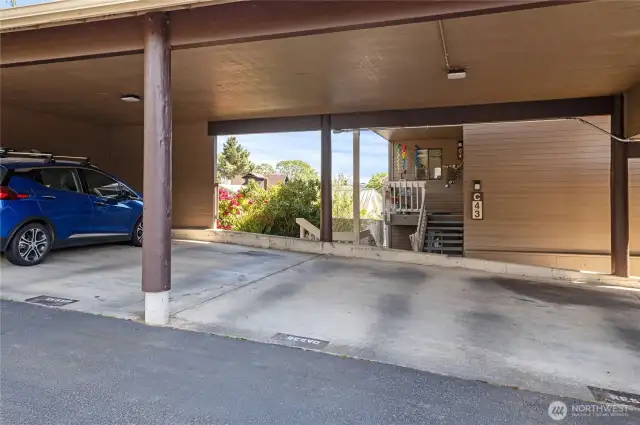 Covered parking - C2. Steps to front door.
