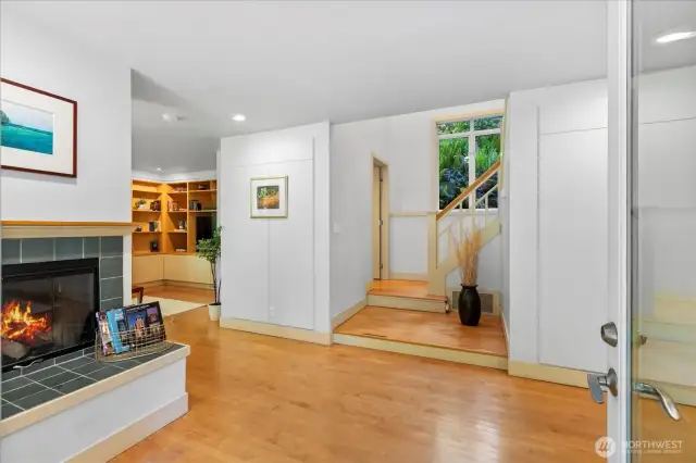 Entry with central fireplace