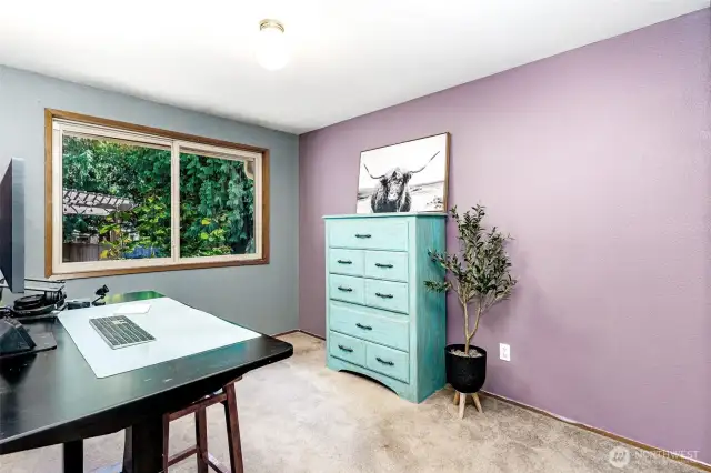 Adjacent to family room is the 4th bedroom/office