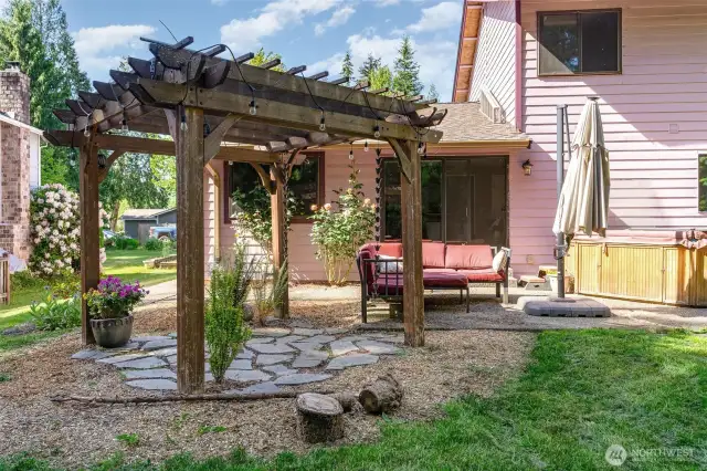 Relax on the patio with pergola and hot tub