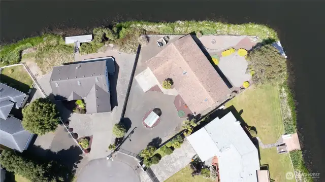 THE HOME IS SURROUNDED ON THREE SIDES WITH WATER!