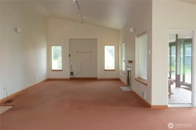 THE DINING ROOM MORPHS INTO THE VAUTED CEILING OF THE OPEN CONCEPT LIVING ROOM!