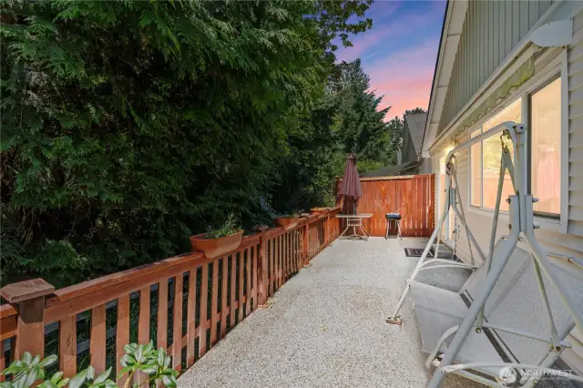 The private, fenced backyard is a true retreat, backing to a lush greenbelt for added serenity and no back neighbors.