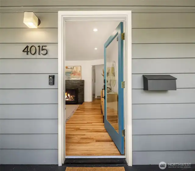 Front entry through covered front porch.