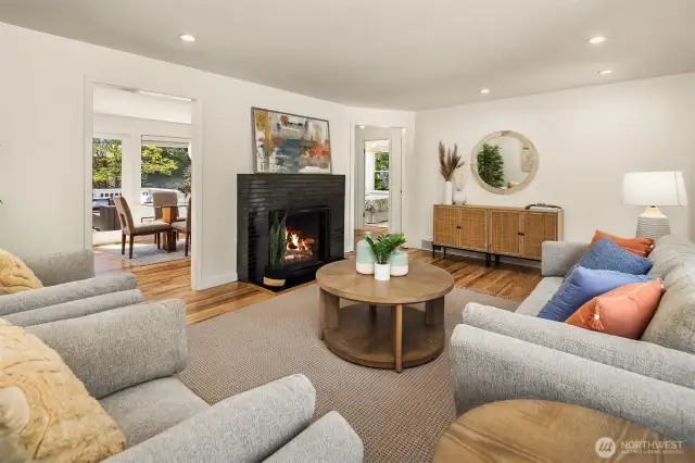 Living room flowing seamlessly into dining area.
