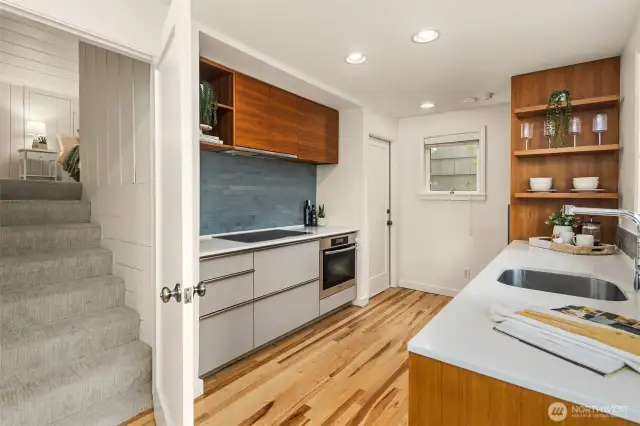 Access to upper lofted bedroom space.