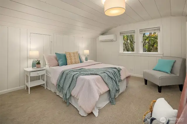 Spacious lofted bedroom.