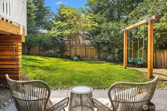 Lower patio area accessible off of bedroom 4 in daylight basement.