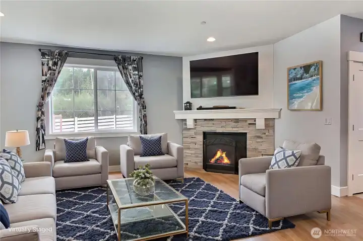 Open floor plan is great for entertaining and leads seamlessly to the covered porch for year round enjoyment