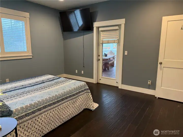 Primary offers access to covered deck and Hot tub