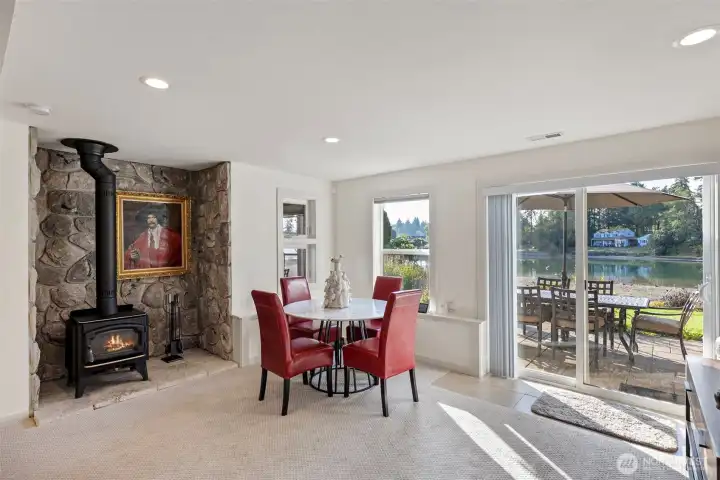 Family room with Wood Stove and access to Patio and Hot Tub