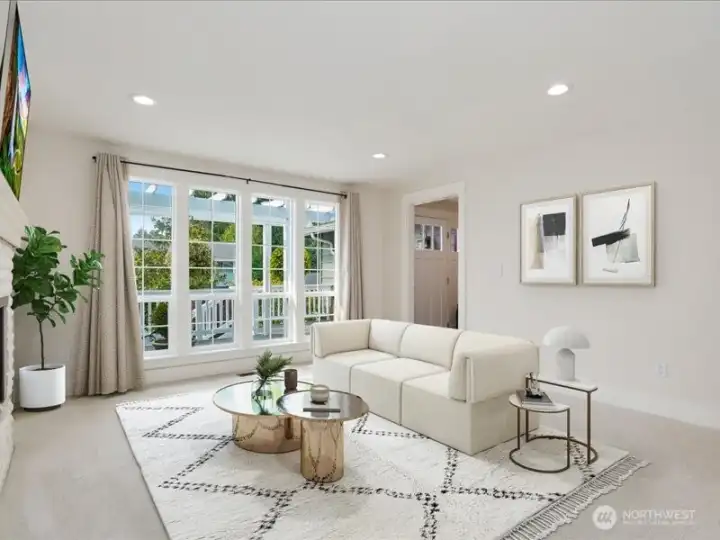 Front flex room with gas fireplace, perfect for formal living, dining, or library.
