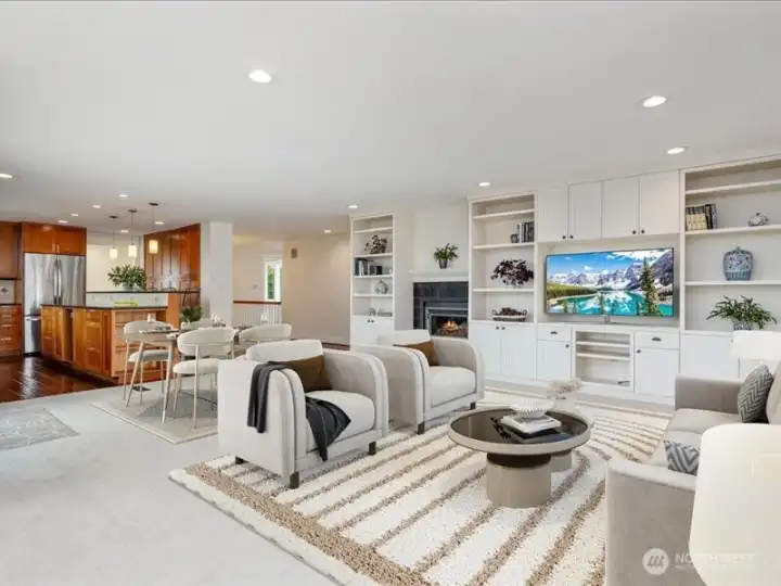 Wonderful gathering room opens to kitchen and deck. Virtually staged.