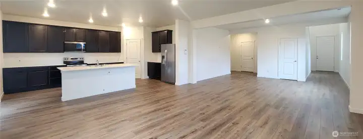 Spacious open concept living and optional main floor bedroom and full bath privately tucked away.