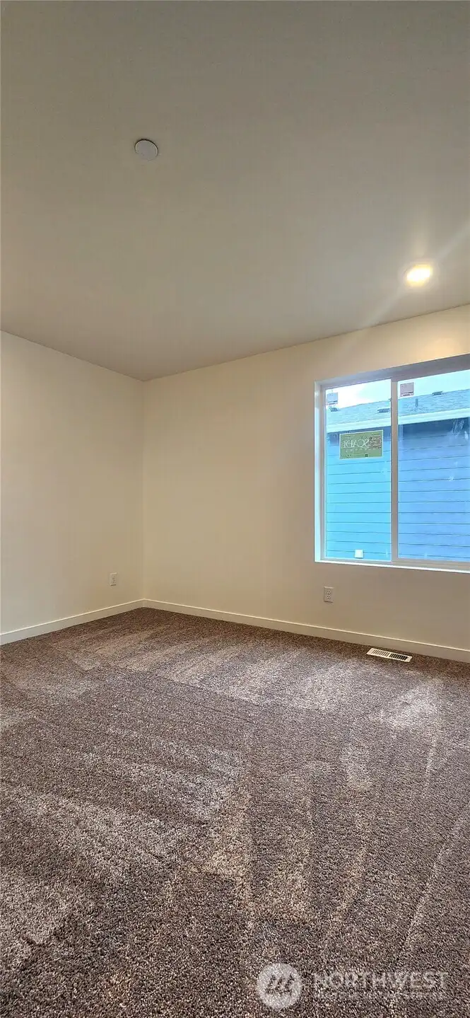 One of 3 additional bedrooms upstairs.