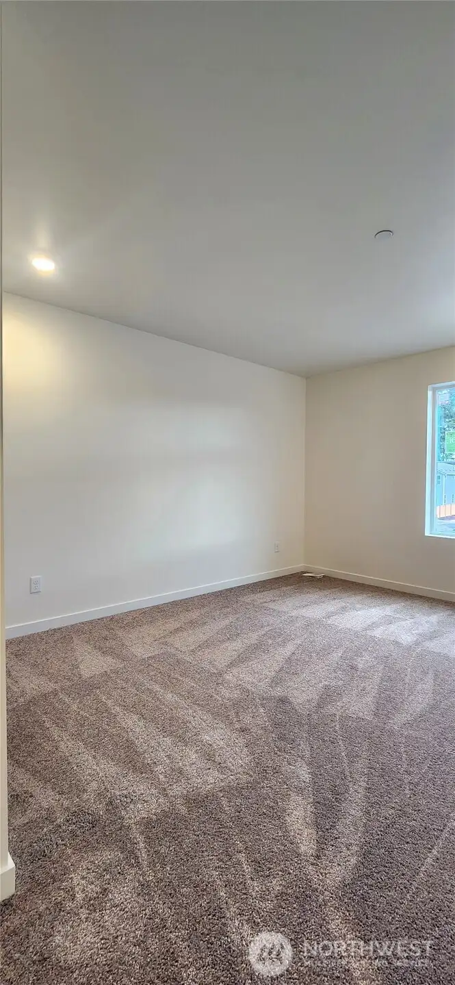 One of 3 additional bedrooms upstairs.
