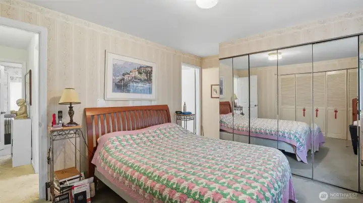 Primary bedroom is complete with duel closets.