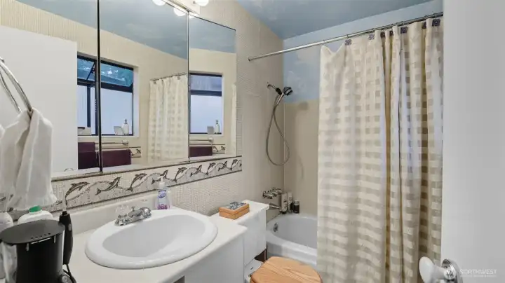 Primary bathroom is attached to the primary bedroom.