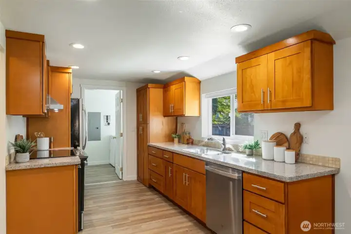 Updated kitchen with granite counters and stainless appliances.
