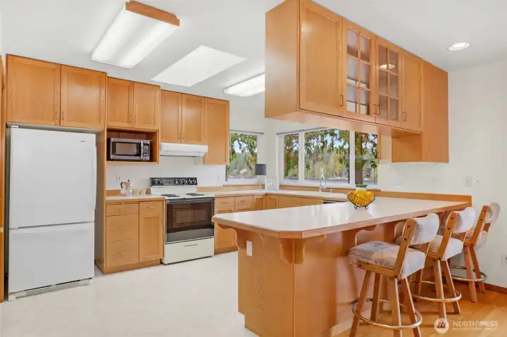 The kitchen is light and bright and has BIG lake views from the beautiful windows.