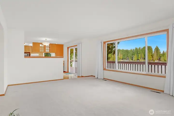 The large fantastic living room on the main level is light and bright and has ample room for furnishings.