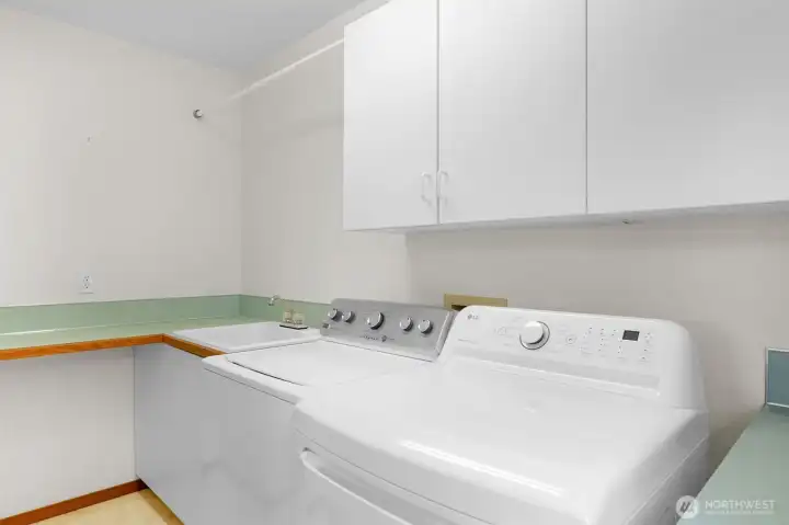 Utility room area located off the kitchen on the main level
